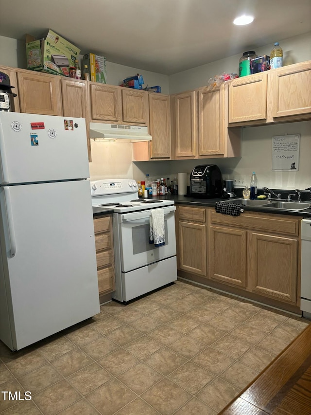 71 Red Ln, Raleigh, NC 27606 - kitchen with white appliances, under cabinet range hood, and dark countertops