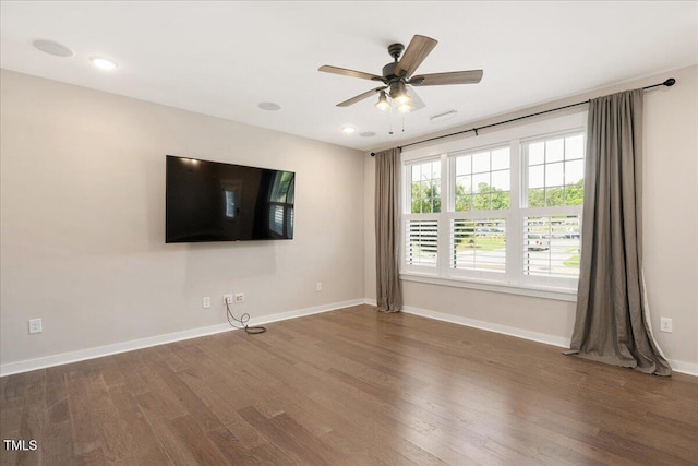 513 Brooks St, Wake Forest, NC 27587 - spare room with wood finished floors, ceiling fan, and recessed lighting