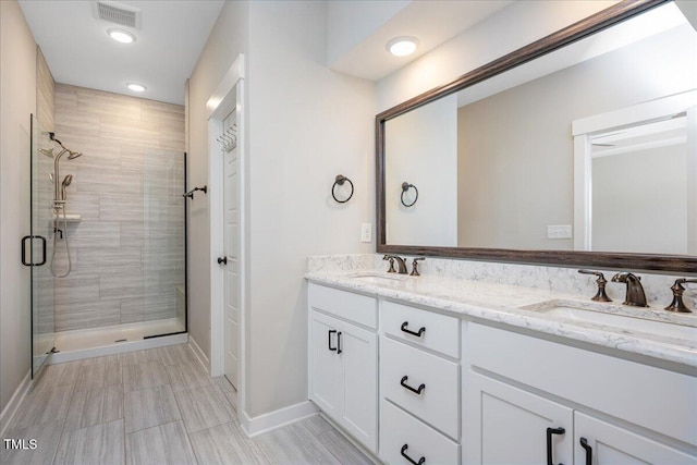 513 Brooks St, Wake Forest, NC 27587 - full bath with a stall shower, double vanity, and recessed lighting