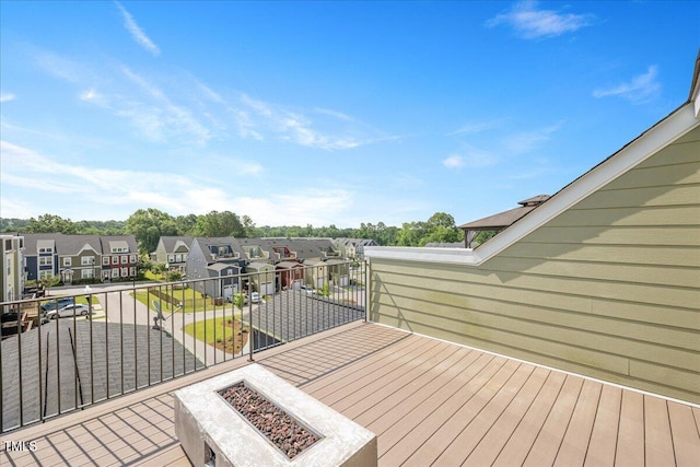 513 Brooks St, Wake Forest, NC 27587 - wooden deck featuring a residential view and a fire pit