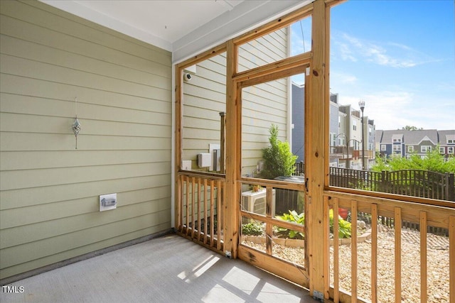 513 Brooks St, Wake Forest, NC 27587 - unfurnished sunroom with a residential view