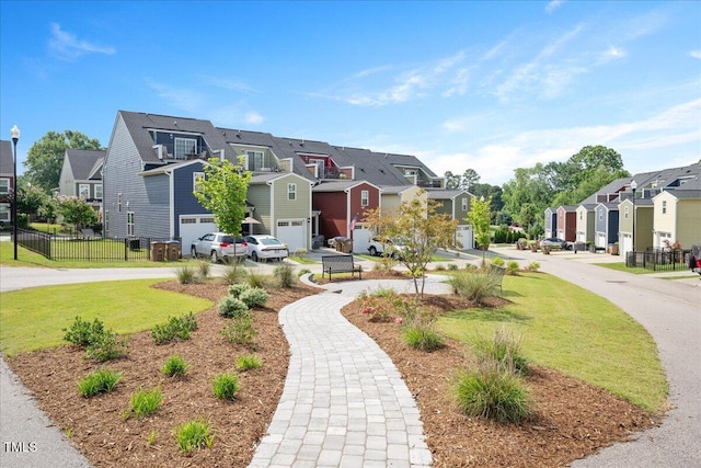 513 Brooks St, Wake Forest, NC 27587 - view of front of home with a residential view, curved driveway, and an attached garage