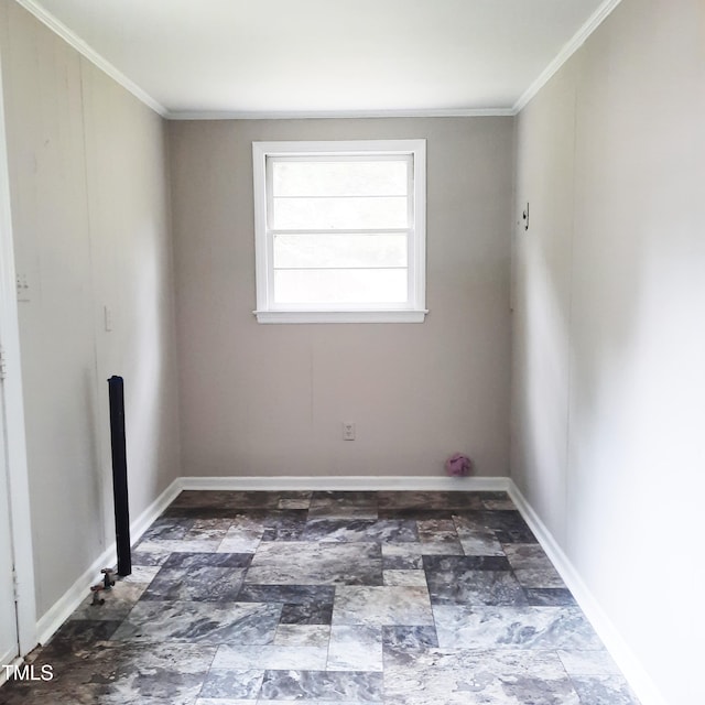 4112 Forrest Ave, Efland, NC 27243 - spare room featuring stone finish flooring and crown molding