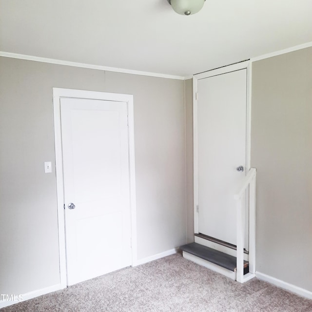 4112 Forrest Ave, Efland, NC 27243 - unfurnished bedroom featuring carpet and crown molding