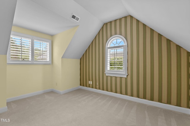4315 Sugar Pine Ln, Durham, NC 27705 - additional living space featuring vaulted ceiling and carpet floors