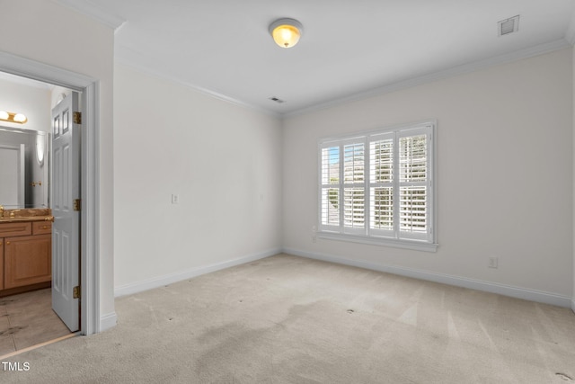 4315 Sugar Pine Ln, Durham, NC 27705 - unfurnished bedroom with light carpet, crown molding, and ensuite bath