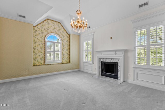 4315 Sugar Pine Ln, Durham, NC 27705 - unfurnished living room with a chandelier, ornamental molding, carpet, vaulted ceiling, and wallpapered walls