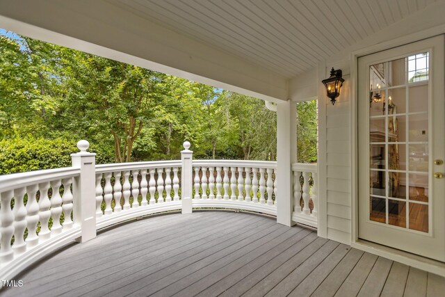 4315 Sugar Pine Ln, Durham, NC 27705 - wooden terrace featuring view of wooded area