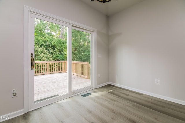 616 Cheselden Dr, Durham, NC 27713 - unfurnished room featuring plenty of natural light and wood finished floors