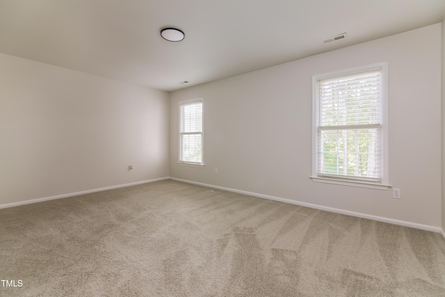 616 Cheselden Dr, Durham, NC 27713 - spare room with baseboards and carpet floors