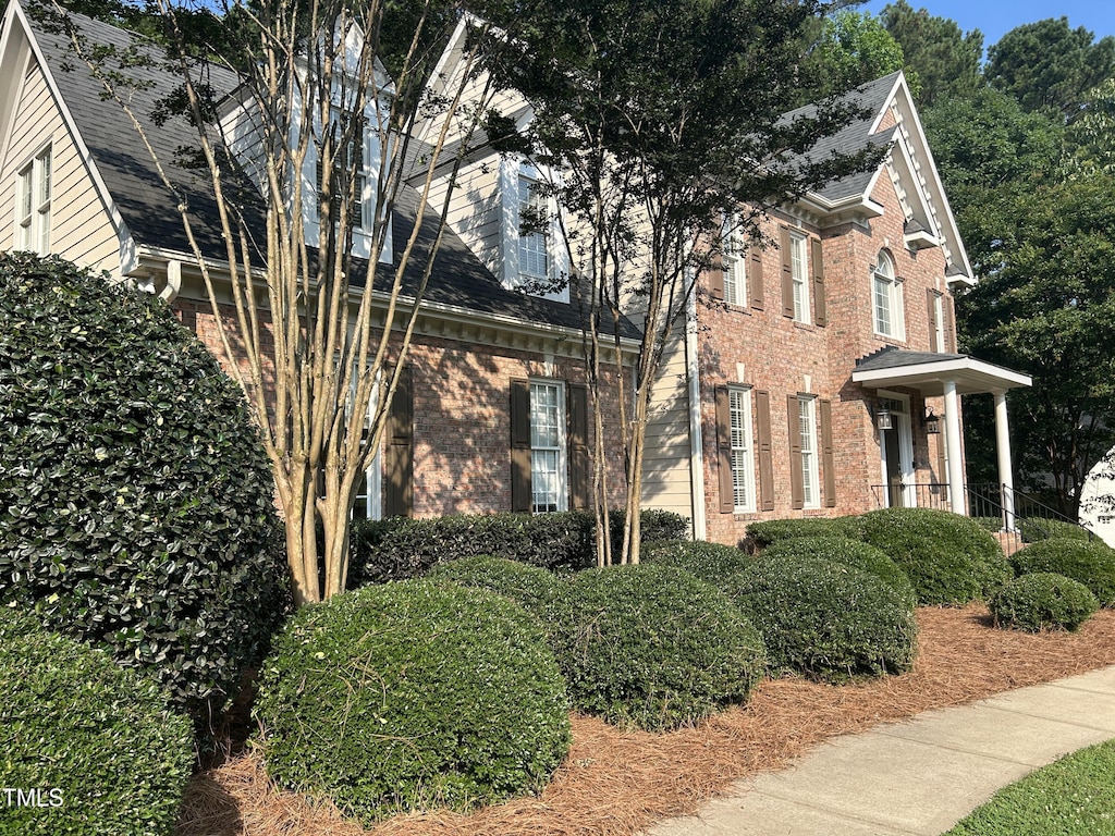 7801 Kingsbrook Ct, Wake Forest, NC 27587 - view of side of home with brick siding