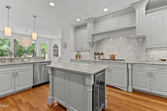 763 Heritage Arbor Dr, Wake Forest, NC 27587 - kitchen with appliances with stainless steel finishes, beverage cooler, decorative backsplash, recessed lighting, and white cabinetry
