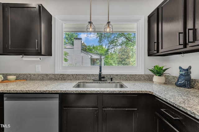 3205 Dell Dr, Raleigh, NC 27609 - kitchen featuring stainless steel dishwasher and decorative light fixtures