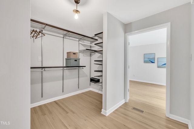 3205 Dell Dr, Raleigh, NC 27609 - walk in closet featuring light wood-style floors