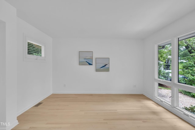 3205 Dell Dr, Raleigh, NC 27609 - unfurnished room featuring light wood-style flooring