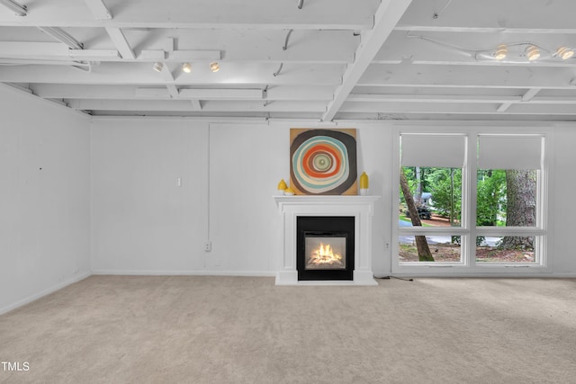 3205 Dell Dr, Raleigh, NC 27609 - basement with carpet floors and a glass covered fireplace
