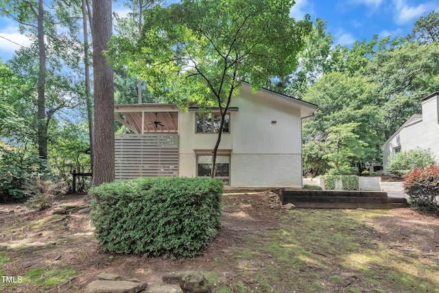 3205 Dell Dr, Raleigh, NC 27609 - rear view of property featuring a ceiling fan