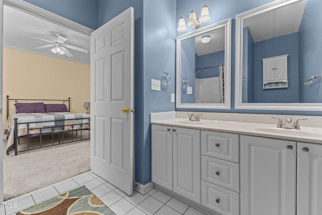 3159 Wisteria Ln Unit 202, Fayetteville, NC 28314 - ensuite bathroom with double vanity, tile patterned flooring, and a ceiling fan