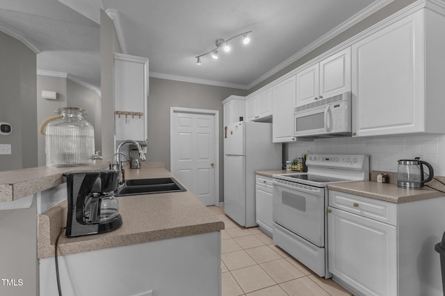 3159 Wisteria Ln Unit 202, Fayetteville, NC 28314 - kitchen with white appliances, white cabinetry, light tile patterned flooring, backsplash, and ornamental molding