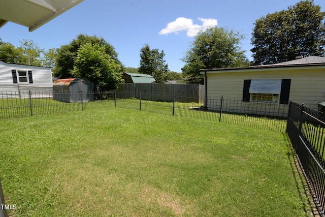 521 S Lombard St, Clayton, NC 27520 - fenced backyard with a storage shed