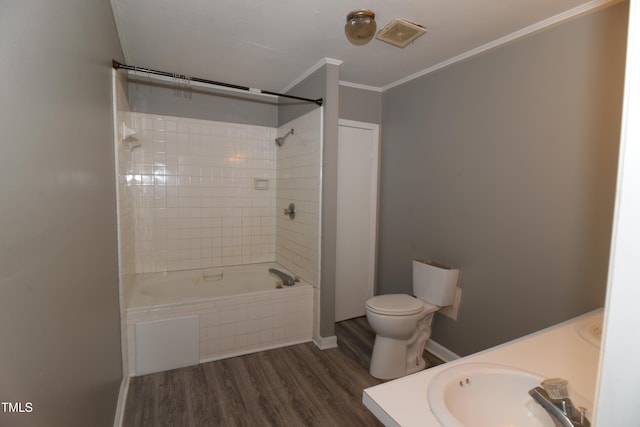 521 S Lombard St, Clayton, NC 27520 - full bathroom with wood finished floors, ornamental molding, vanity, and shower / bath combination