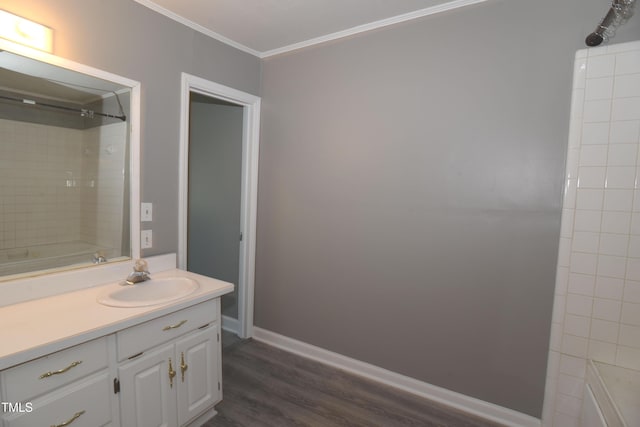521 S Lombard St, Clayton, NC 27520 - full bathroom with ornamental molding, vanity, and wood finished floors