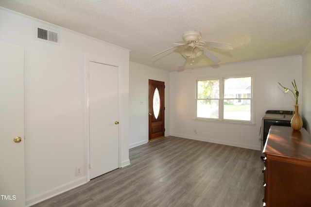 521 S Lombard St, Clayton, NC 27520 - entrance foyer featuring ceiling fan, wood finished floors, and a textured ceiling