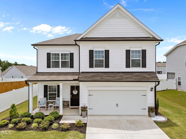 3613 Cross Timber Ln, Raleigh, NC 27603 - traditional home featuring covered porch, a shingled roof, concrete driveway, and an attached garage