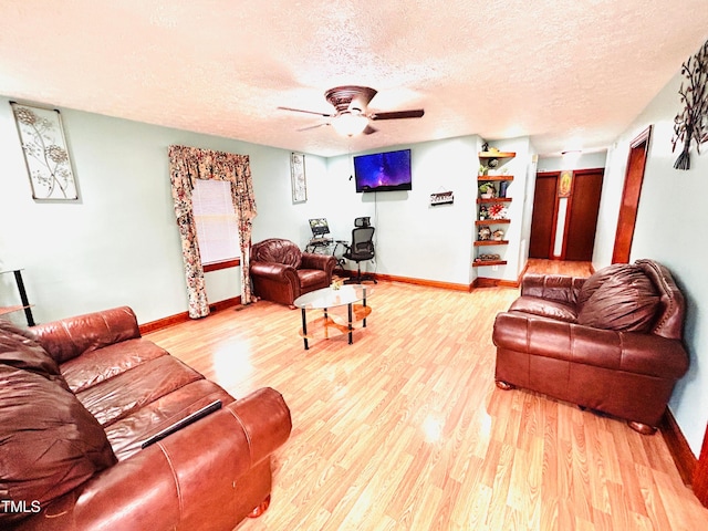 1337 Maple St, Rocky Mount, NC 27803 - living room featuring a textured ceiling, wood finished floors, and a ceiling fan
