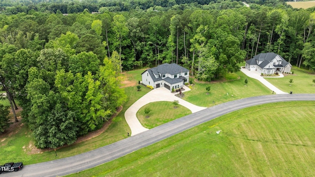 310 Hidden Lake Dr, Youngsville, NC 27596 - aerial view of property and surrounding area with a forest
