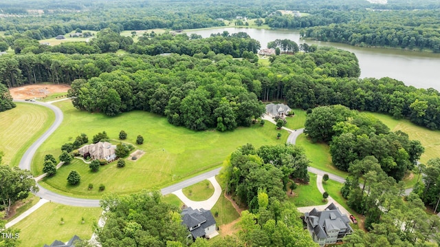 310 Hidden Lake Dr, Youngsville, NC 27596 - drone / aerial view of a large body of water and a heavily wooded area