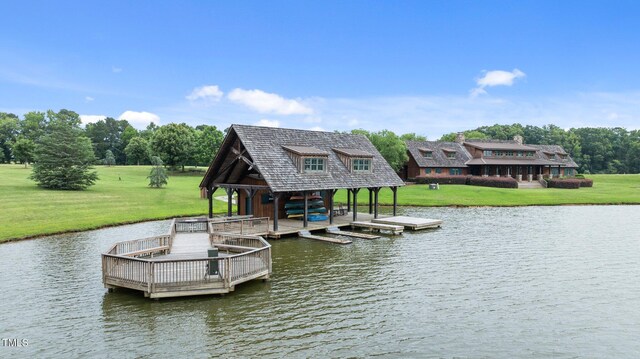 310 Hidden Lake Dr, Youngsville, NC 27596 - dock featuring a water view and a lawn
