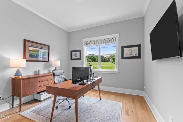 310 Hidden Lake Dr, Youngsville, NC 27596 - home office with light wood-style flooring and crown molding