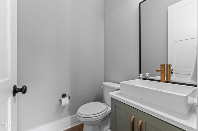 310 Hidden Lake Dr, Youngsville, NC 27596 - bathroom with vanity and wood finished floors