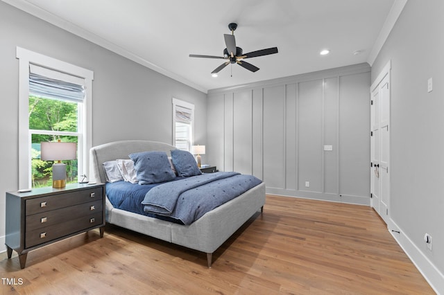 310 Hidden Lake Dr, Youngsville, NC 27596 - bedroom with ornamental molding, light wood-style floors, recessed lighting, and a ceiling fan