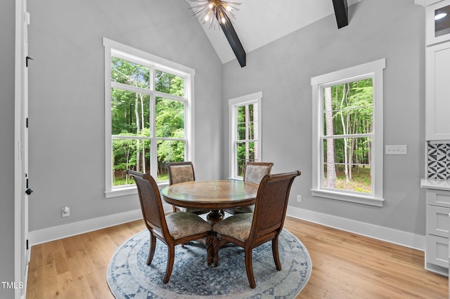 310 Hidden Lake Dr, Youngsville, NC 27596 - dining space featuring plenty of natural light, light wood-style floors, and high vaulted ceiling