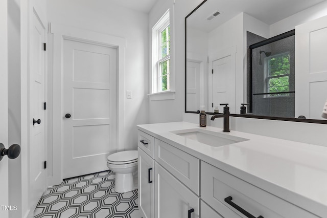 310 Hidden Lake Dr, Youngsville, NC 27596 - full bathroom with vanity and an enclosed shower