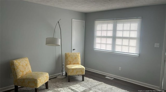 6444 Applecross Ave Unit A, B, C, Fayetteville, NC 28304 - sitting room featuring a textured ceiling and baseboards