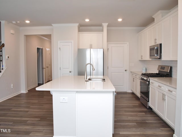 2002 Strickland Oak Way, Durham, NC 27703 - kitchen with stainless steel appliances, recessed lighting, dark wood finished floors, a kitchen island with sink, and crown molding