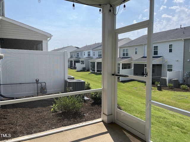 2002 Strickland Oak Way, Durham, NC 27703 - unfurnished sunroom featuring a residential view