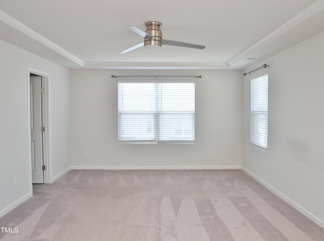 2002 Strickland Oak Way, Durham, NC 27703 - spare room with light colored carpet, a ceiling fan, a tray ceiling, and ornamental molding