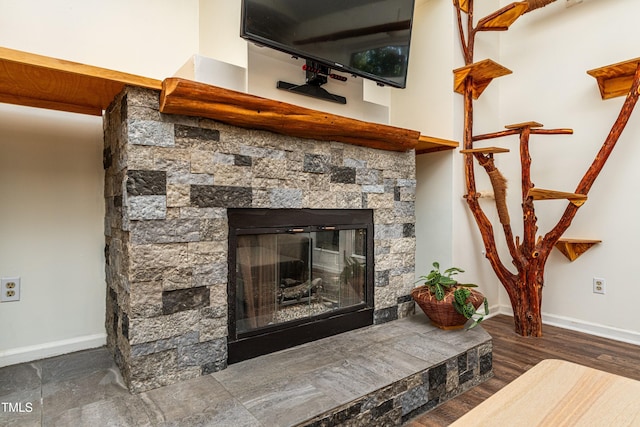 3616 Culater Ct, Raleigh, NC 27616 - detailed view of a stone fireplace and wood finished floors