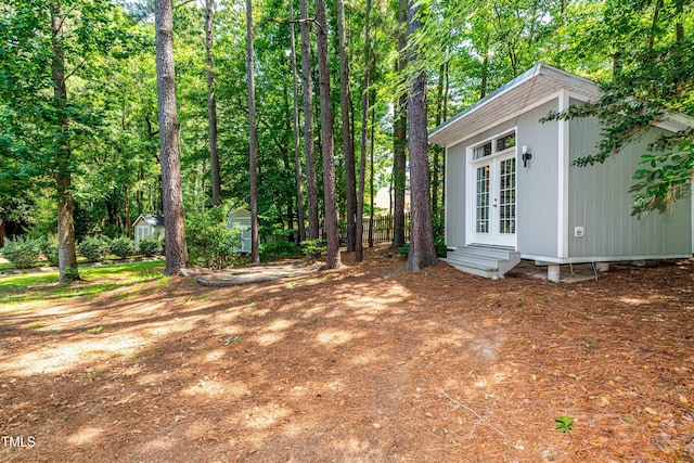 3616 Culater Ct, Raleigh, NC 27616 - view of yard with french doors, an outdoor structure, and entry steps