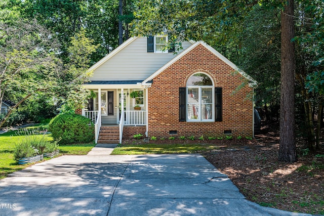 3616 Culater Ct, Raleigh, NC 27616 - bungalow-style home featuring a porch, crawl space, and brick siding
