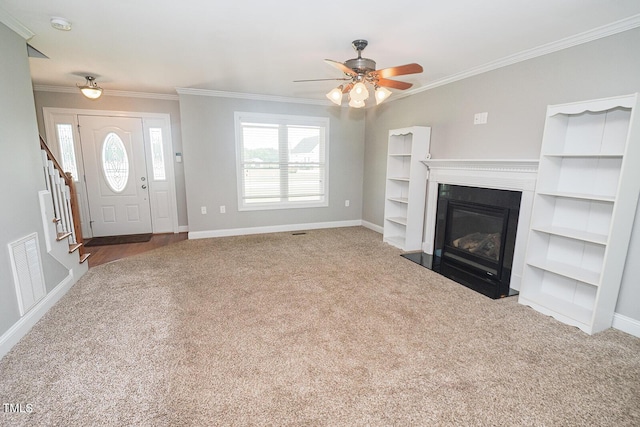 90 Liberty Ln, Autryville, NC 28318 - unfurnished living room with carpet flooring, a ceiling fan, ornamental molding, a fireplace with flush hearth, and stairway