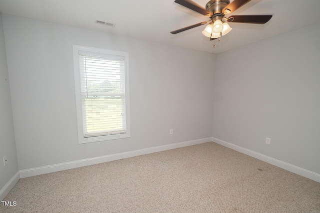 90 Liberty Ln, Autryville, NC 28318 - carpeted spare room with baseboards and ceiling fan