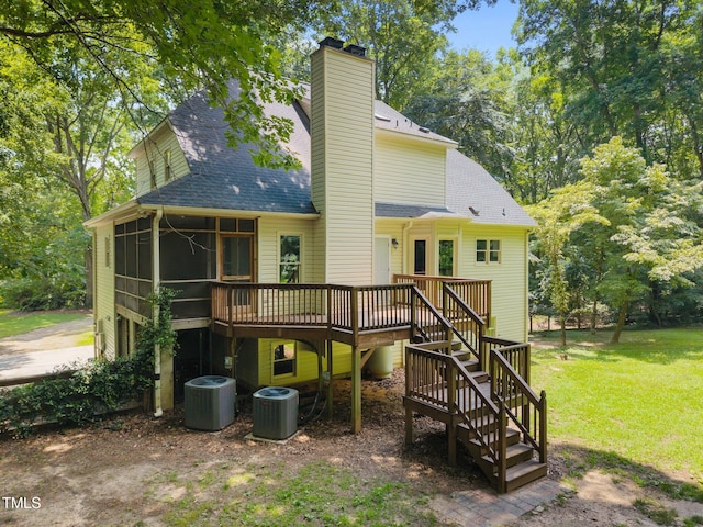 6001 Waters Way Dr, Raleigh, NC 27606 - rear view of house featuring a chimney, a deck, a shingled roof, stairs, and a yard