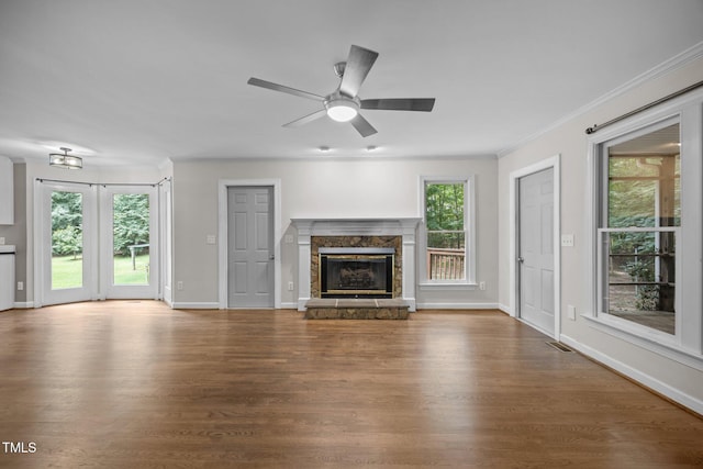 6001 Waters Way Dr, Raleigh, NC 27606 - unfurnished living room featuring wood finished floors, a fireplace, a ceiling fan, and ornamental molding