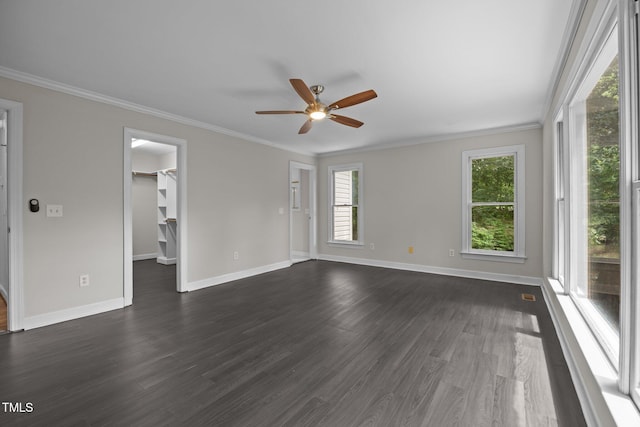 6001 Waters Way Dr, Raleigh, NC 27606 - unfurnished room with ceiling fan, plenty of natural light, crown molding, and dark wood-style floors