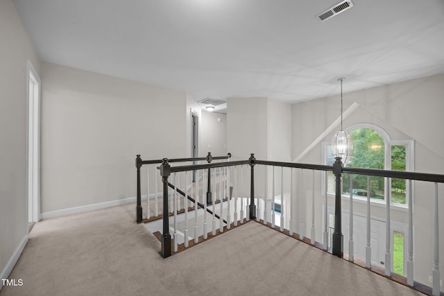 6001 Waters Way Dr, Raleigh, NC 27606 - hall featuring an upstairs landing and carpet flooring